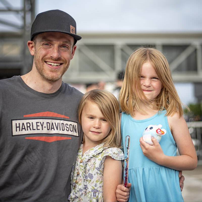 Dad with two young daughters